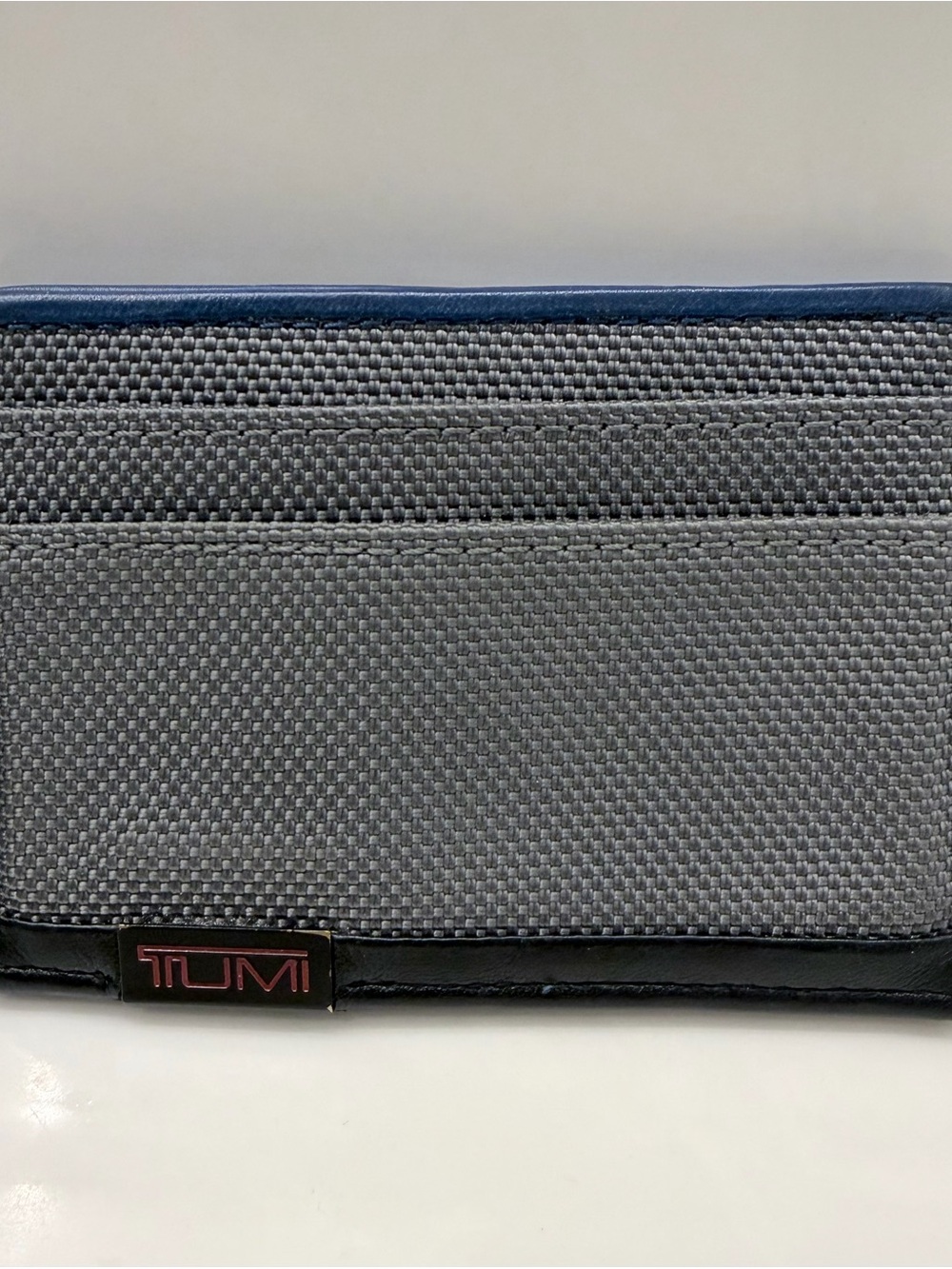 Tumi Gray Canvas and Black Trim Card Sleeve with Navy Accent